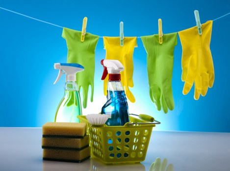 Bow home cleaners performing detailed bathroom cleaning
